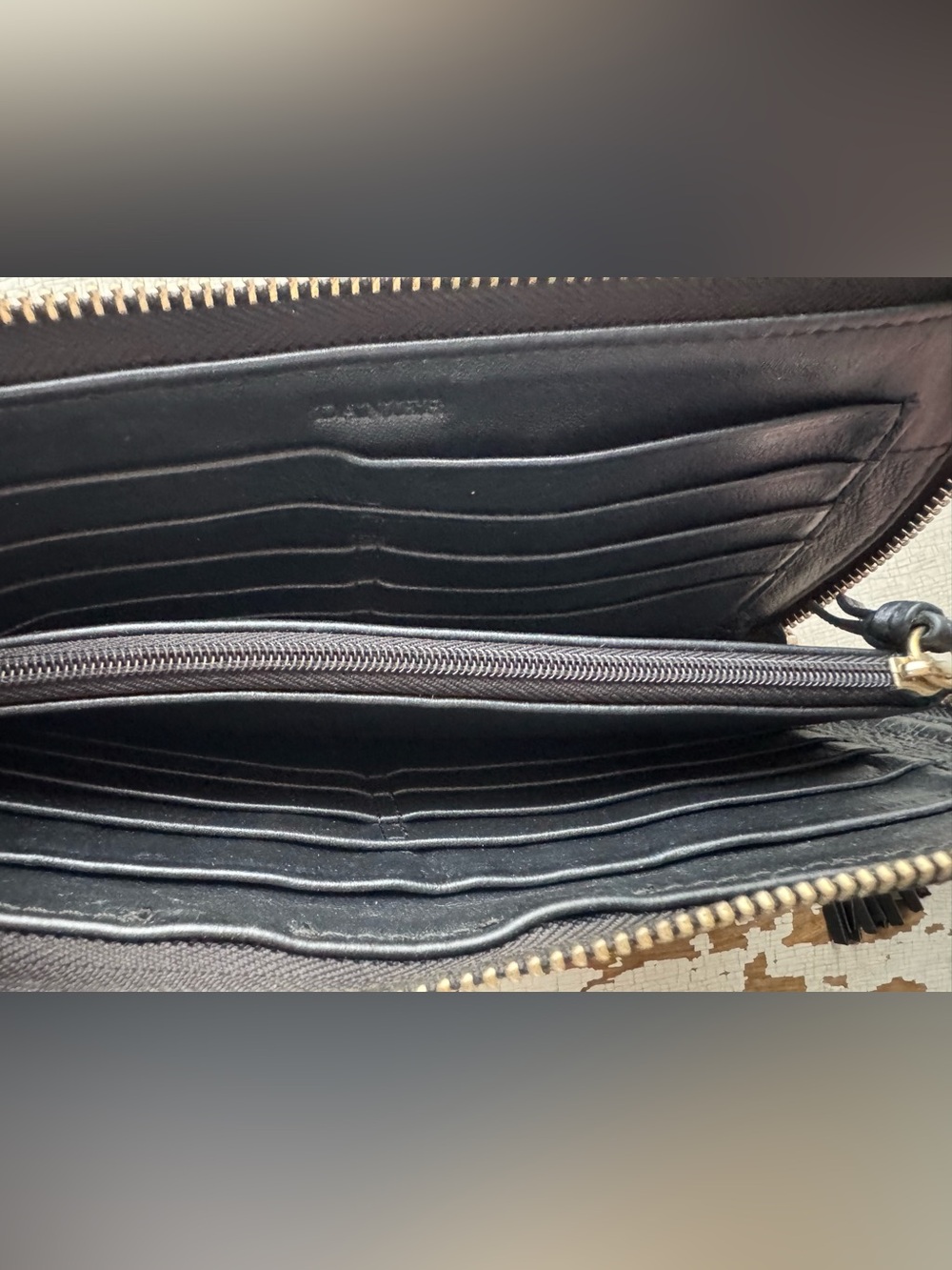 Danier Black Zip-Around Tassel Wallet - Picture 2 of 3